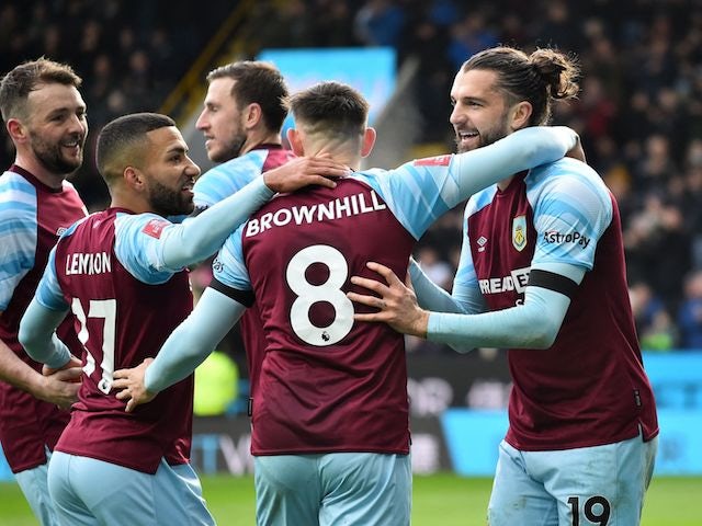 Burnley's Jay Rodriguez celebrates scoring their first goal with teammates on January 8, 2022