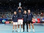 Canada's Felix Auger-Aliassime, Denis Shapovalov, Steven Diez and Brayden Schnur pose with the trophy as they celebrate after winning the ATP Cup on January 9, 2021