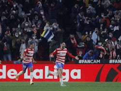 Granada's Antonio Puertas celebrates scoring their first goal with Carlos Bacca on January 8, 2022