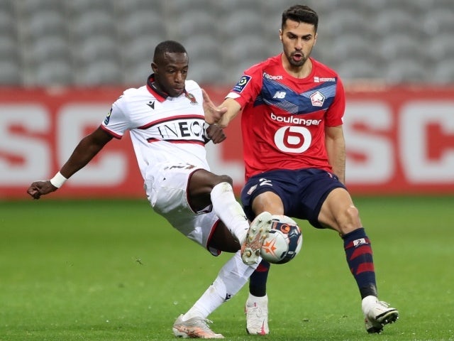 Lille's Benjamin Andre in action with OGC Nice's Hassane Kamara, May 1, 2021