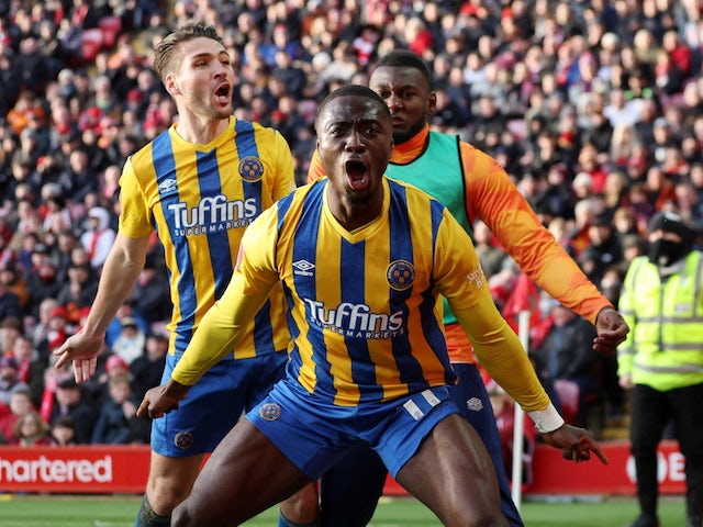 Shrewsbury Town's Daniel Udoh celebrates scoring their first goal with Luke Leahy on January 9, 2022