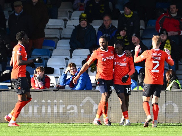Luton Town's Cameron Jerome celebrates scoring their second goal with Carlos Mendes Gomes on January 9, 2022