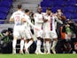 Olympique Lyonnais' Lucas Paqueta celebrates scoring their first goal with teammates on January 9, 2022