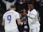 Real Madrid's Vinicius Junior celebrates scoring their second goal with Karim Benzema on January 8, 2022