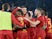 Roma's Henrikh Mkhitaryan celebrates scoring their second goal with Jordan Veretout, Matias Vina and teammates on January 9, 2022
