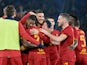 Roma's Henrikh Mkhitaryan celebrates scoring their second goal with Jordan Veretout, Matias Vina and teammates on January 9, 2022