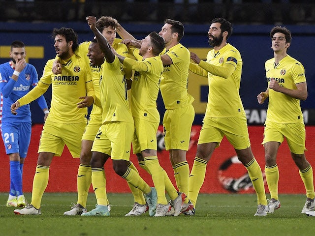 Villarreal's Pau Torres celebrates scoring their first goal with teammates on January 9, 2022