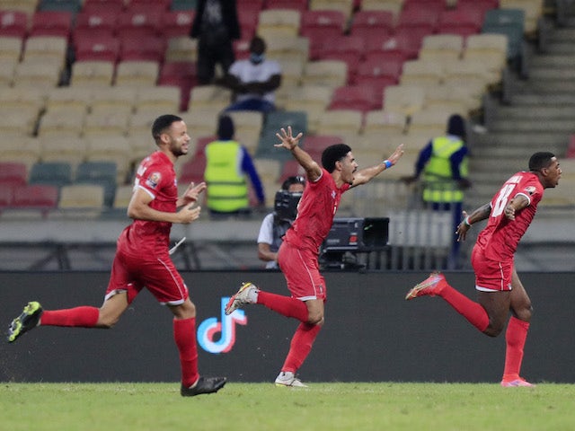 Equatorial Guinea players celebrate their first goal scored by Esteban Obiang on January 16, 2022
