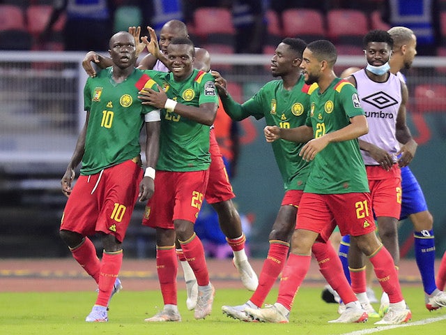 Cameroon's Vincent Aboubakar celebrates scoring their third goal with teammates on January 13, 2022
