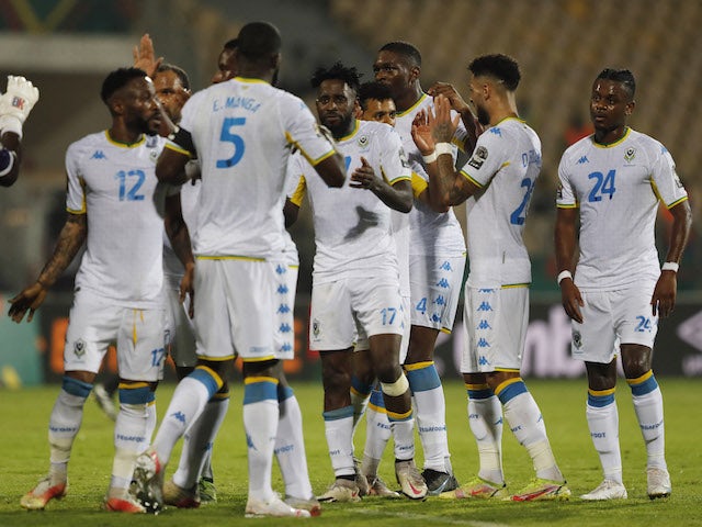 Gabon's Andre Biyogo Poko, Bruno Ecuele Manga and teammates celebrate after the match on January 10, 2022