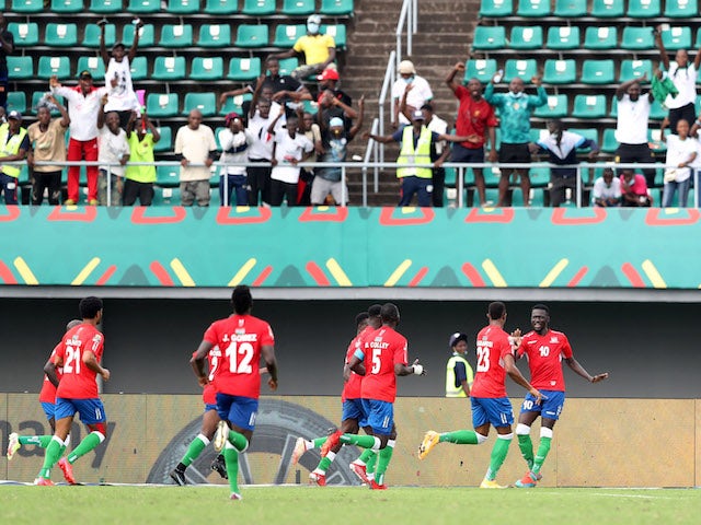 Gambia's Musa Barrow celebrates scoring their first goal with teammates on January 16, 2022
