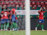 Gambia's Ablie Jallow celebrates scoring their first goal with teammates on January 12, 2022