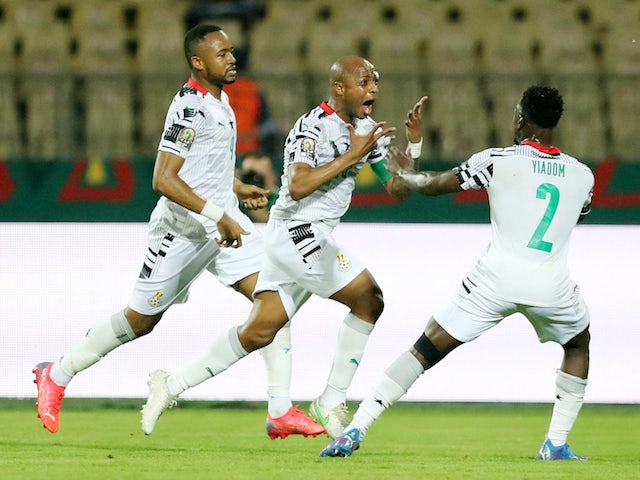 Ghana's Andre Ayew celebrates scoring their first goal with teammates on January 14, 2022