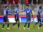 Hoffenheim players celebrate with teammates after Union Berlin's Timo Baumgartl scored an own goal on January 15, 2022