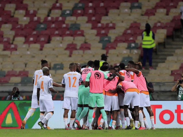 Ivory Coast's Max-Alain Gradel celebrates scoring their first goal with teammates on January 12, 2022
