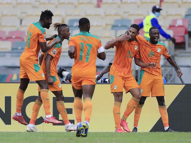 Ivory Coast's Sebastien Haller celebrates scoring their first goal with teammates on January 16, 2022
