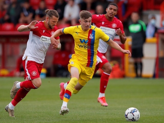 Crystal Palace's Jack Wells-Morrison in action with Stevenage's Jake Reeves, July 23, 2021