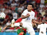 France's Jules Kounde in action with Portugal's Sergio Oliveira, June 23, 2021
