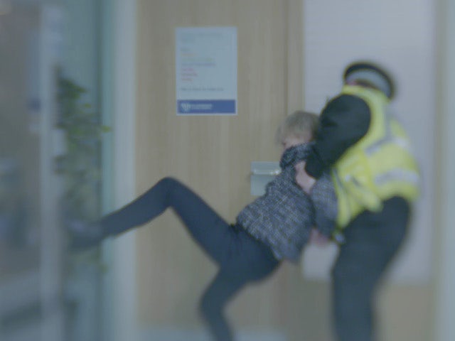 Sally is restrained by the police on the first episode of Coronation Street on January 24, 2022