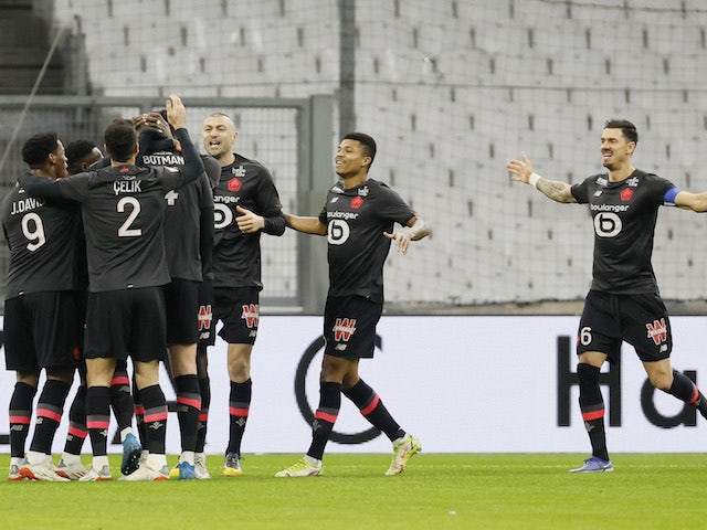 Lille's Sven Botman celebrates scoring their first goal with teammates on January 16, 2022