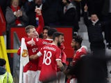Manchester United's Scott McTominay celebrates scoring their first goal with teammates on January 10, 2022