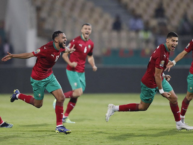 Morocco's Sofiane Boufal celebrates scoring their first goal with teammates on January 10, 2022