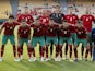 Morocco players pose for a team group photo before the match on January 10, 2022