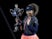 Naomi Osaka celebrates with the Australian Open trophy in 2021