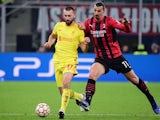 Liverpool's Nathaniel Phillips in action with AC Milan's Zlatan Ibrahimovic, December 7, 2021