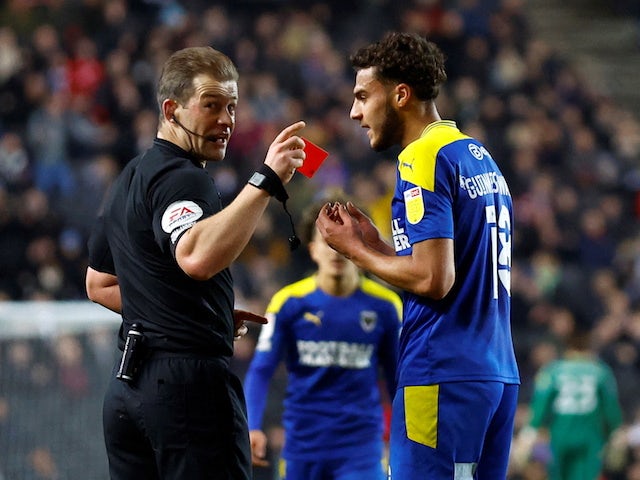 AFC Wimbledon's Nesta Guinness Walker is shown a red card by referee on January 11, 2022