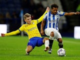 Birmingham City's Riley McGree in action with Huddersfield Town's Duane Holmes on October 20, 2021