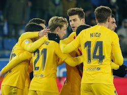 Barcelona's Frenkie de Jong celebrates scoring their first goal with teammates on January 23, 2022