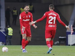 Atletico Madrid's Matheus Cunha celebrates scoring their first goal with Yannick Carrasco on January 22, 2022
