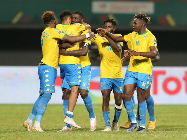 Gabon players celebrate their first goal, an own goal scored by Burkina Faso's Adama Guira on January 23, 2022