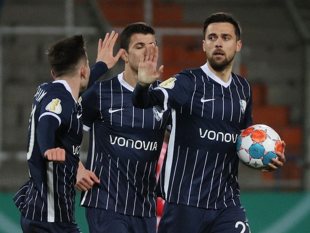 Bochum's Milos Pantovic celebrates scoring their first goal with teammates on January 18, 2022