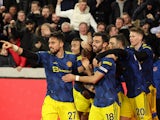 Manchester United's Anthony Elanga celebrates scoring their first goal with teammates on January 19, 2022