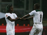 Borussia Monchengladbach's Kouadio Kone celebrates scoring their first goal with Denis Zakaria on January 22, 2022