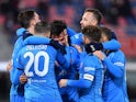 Napoli's Hirving Lozano celebrates scoring their second goal with teammates on January 17, 2022