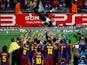 Barcelona's manager Pep Guardiola is thrown in the air by his players after their Champions League final win against Manchester United on May 28, 2011