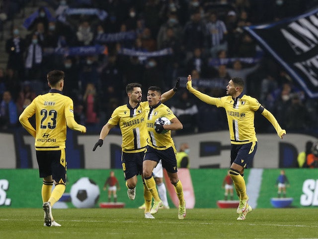 Famalicao's Riccieli celebrates scoring their first goal with teammates on January 23, 2022