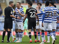 Reading's Michael Morrison talks to referee Robert Jones after Huddersfield's Danny Ward scored their third goal on January 22, 2022