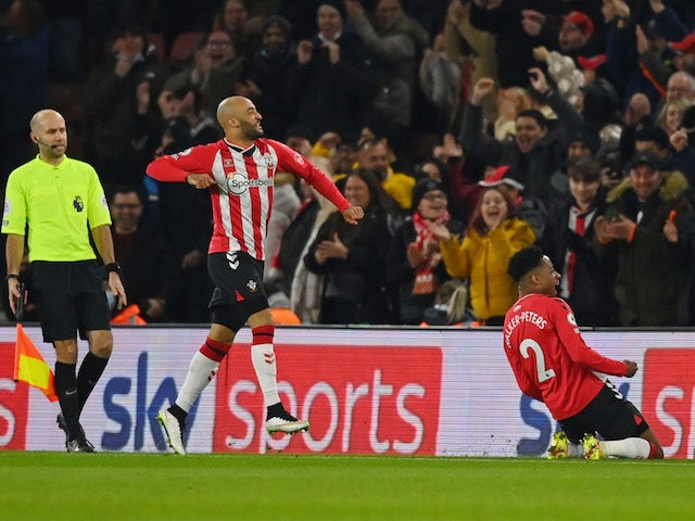 Southampton's Kyle Walker-Peters celebrates scoring their first goal with Nathan Redmond on January 22, 2022