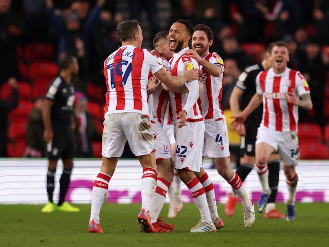 Stoke City's Lewis Baker celebrates scoring their second goal with teammates on January 22, 2022