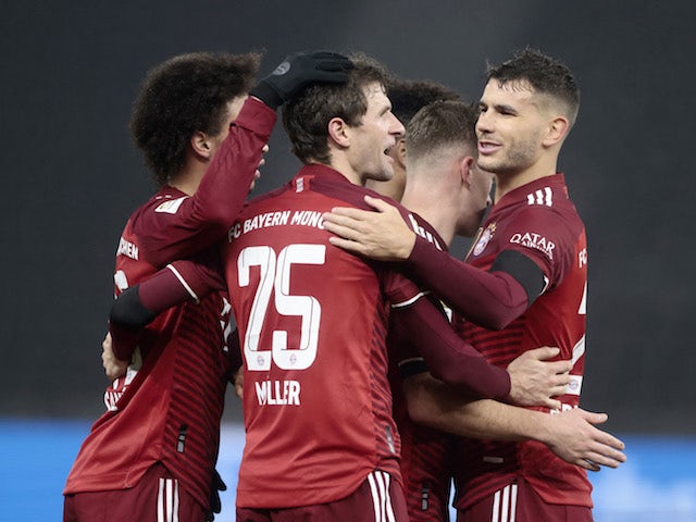 Bayern Munich's Thomas Muller celebrates scoring their second goal with teammates on January 23, 2022