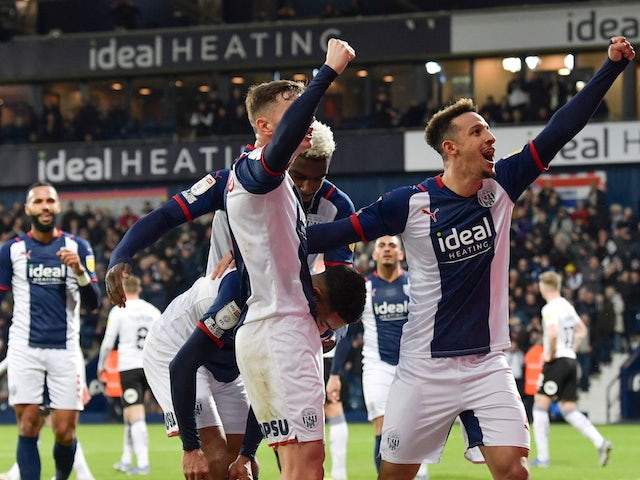 West Bromwich Albion's Darnell Furlong celebrates scoring their first goal with teammates on January 22, 2022