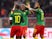 Cameroon's Karl Toko-Ekambi celebrates scoring their first goal with Vincent Aboubakar and Eric Maxim Choupo-Moting on January 24, 2022