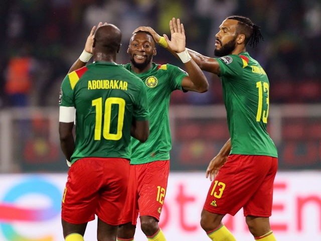 Cameroon's Karl Toko-Ekambi celebrates scoring their first goal with Vincent Aboubakar and Eric Maxim Choupo-Moting on January 24, 2022