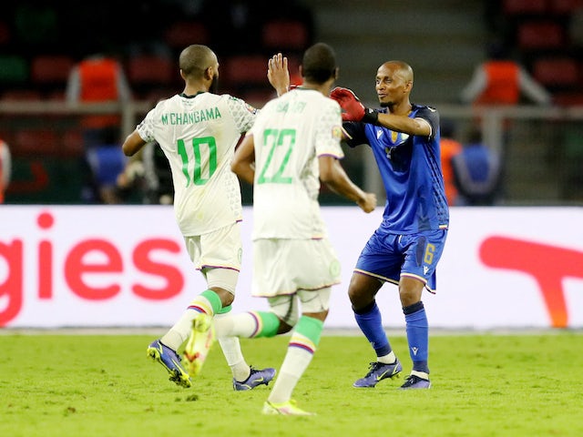 Comoros' Youssouf M'Changama celebrates scoring their first goal with Chaker Alhadhur on January 24, 2022