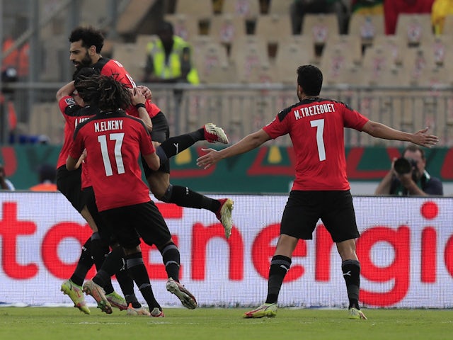 Egypt's Mohamed Salah celebrates scoring their first goal with teammates on January 30, 2022