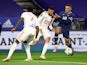 Lyon's Emerson in action with Paris Saint-Germain's (PSG's) Kylian Mbappe in January 2022